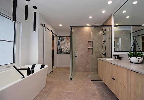 Todd Lewys / Free Press 
Elegant yet functional, the beautifully finished ensuite is a spa-like retreat.