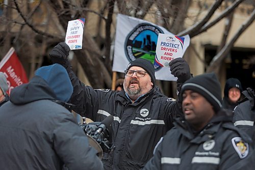 MIKE DEAL / FREE PRESS
Transit driver, Christian Brambilla, waves signs during rally.
Members of the Amalgamated Transit Union Local 1505 hold a rally Tuesday morning outside city hall pushing for improved safety measures on Winnipeg Transit.
ATU local 1505 president, Chris Scott, speaks during the rally outside city hall.
Reporter: Erik Pindera
241126 - Tuesday, November 26, 2024.