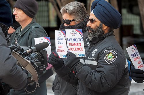 MIKE DEAL / FREE PRESS
Transit driver, Mandeep Singh, holds a signs saying &#x201c;Secure Seats Safe Streets,&#x201d; and &#x201c;Say No to Transit Violence&#x201d; during rally.
Members of the Amalgamated Transit Union Local 1505 hold a rally Tuesday morning outside city hall pushing for improved safety measures on Winnipeg Transit.
ATU local 1505 president, Chris Scott, speaks during the rally outside city hall.
Reporter: Erik Pindera
241126 - Tuesday, November 26, 2024.