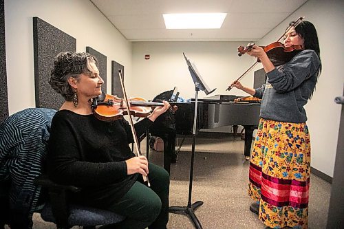 MIKAELA MACKENZIE / FREE PRESS
	
Metis fiddling instructor Patti Kusturok (left) and Indigenous Studies grad student Krysta Alexson at the University of Manitoba on Tuesday, Nov. 26, 2024. The new class is the first of its kind in Canada, and was inspired by reconciliation.

For Scott story.
Winnipeg Free Press 2024