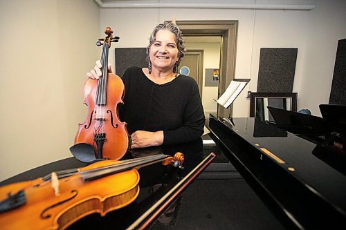 MIKAELA MACKENZIE / FREE PRESS
	
Metis fiddling instructor Patti Kusturok in her classroom at the University of Manitoba on Tuesday, Nov. 26, 2024. The new class is the first of its kind in Canada, and was inspired by reconciliation.

For Scott story.
Winnipeg Free Press 2024