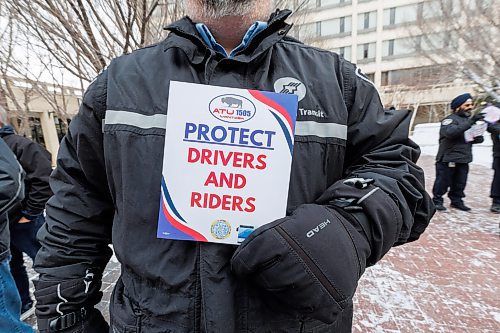 MIKE DEAL / FREE PRESS
Transit driver, Christian Brambilla, holds a sign saying &#x201c;Protect Drivers and Riders&#x201d; during rally.
Members of the Amalgamated Transit Union Local 1505 hold a rally Tuesday morning outside city hall pushing for improved safety measures on Winnipeg Transit.
ATU local 1505 president, Chris Scott, speaks during the rally outside city hall.
Reporter: Erik Pindera
241126 - Tuesday, November 26, 2024.