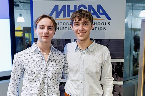 MIKE DEAL / FREE PRESS
Gabrielle-Roy Les Roys boys volleyball team members, Martin de Moissac (left) and Alek Ouimet (right) at the schedule announcement for the 2024&#xa0;Boston Pizza AAAA Provincial Volleyball Championships at the Manitoba Sports Hall of Fame (145 Pacific Avenue) Tuesday afternoon.
Reporter: Mike Sawatzky
241126 - Tuesday, November 26, 2024.