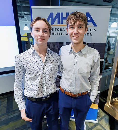 MIKE DEAL / FREE PRESS
Gabrielle-Roy Les Roys boys volleyball team members, Martin de Moissac (left) and Alek Ouimet (right) at the schedule announcement for the 2024&#xa0;Boston Pizza AAAA Provincial Volleyball Championships at the Manitoba Sports Hall of Fame (145 Pacific Avenue) Tuesday afternoon.
Reporter: Mike Sawatzky
241126 - Tuesday, November 26, 2024.