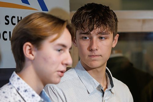 MIKE DEAL / FREE PRESS
Gabrielle-Roy Les Roys boys volleyball team members, Martin de Moissac (left) and Alek Ouimet (right) at the schedule announcement for the 2024&#xa0;Boston Pizza AAAA Provincial Volleyball Championships at the Manitoba Sports Hall of Fame (145 Pacific Avenue) Tuesday afternoon.
Reporter: Mike Sawatzky
241126 - Tuesday, November 26, 2024.