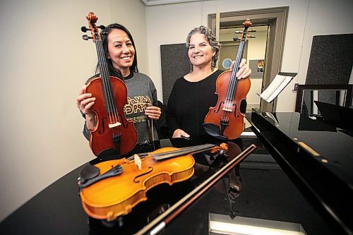 MIKAELA MACKENZIE / FREE PRESS
	
Metis fiddling instructor Patti Kusturok (right) and Indigenous Studies grad student Krysta Alexson at the University of Manitoba on Tuesday, Nov. 26, 2024. The new class is the first of its kind in Canada, and was inspired by reconciliation.

For Scott story.
Winnipeg Free Press 2024