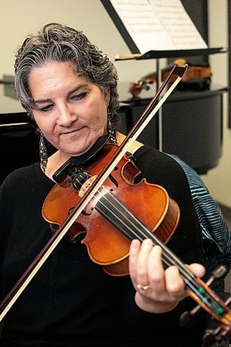 MIKAELA MACKENZIE / FREE PRESS
	
Metis fiddling instructor Patti Kusturok in her classroom at the University of Manitoba on Tuesday, Nov. 26, 2024. The new class is the first of its kind in Canada, and was inspired by reconciliation.

For Scott story.
Winnipeg Free Press 2024