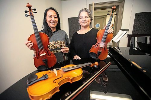 MIKAELA MACKENZIE / FREE PRESS
	
Metis fiddling instructor Patti Kusturok (right) and Indigenous Studies grad student Krysta Alexson at the University of Manitoba on Tuesday, Nov. 26, 2024. The new class is the first of its kind in Canada, and was inspired by reconciliation.

For Scott story.
Winnipeg Free Press 2024