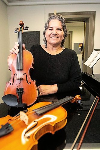 MIKAELA MACKENZIE / FREE PRESS
	
Metis fiddling instructor Patti Kusturok in her classroom at the University of Manitoba on Tuesday, Nov. 26, 2024. The new class is the first of its kind in Canada, and was inspired by reconciliation.

For Scott story.
Winnipeg Free Press 2024