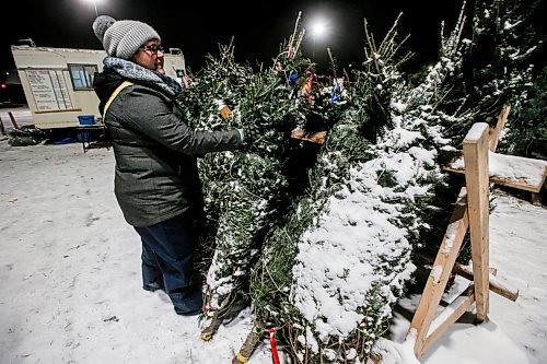 JOHN WOODS / FREE PRESS
Cori-Lee Roberts, coordinator of the Friends of 67th Christmas Tree Lot at River Heights Community Club, is photographed as she volunteers at the lot Wednesday, November 26, 2024. The 67th Winnipeg Scout group has been selling Christmas trees for 60 years.

Reporter: skye