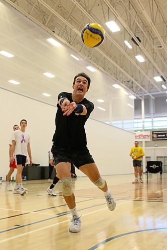 Riley Brunet chases a ball down during the BU men's volleyball team's "tennis" warmup game at practice on Wednesday. The men face the country's top-ranked Golden Bears this weekend. (Thomas Friesen/The Brandon Sun)