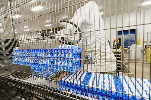 MIKE DEAL / FREE PRESS
A large robotic arm lifts huge pallets of eggs in the processing plant.
Agriculture Minister Ron Kostyshyn announces during a press conference at the Burnbrae Farms processing plant (500 Pandora Ave. W), that the governments of Canada and Manitoba are investing in several major capital infrastructure and investment projects under the Sustainable Canadian Agriculture Partnership (Sustainable CAP) that will increase food processing capacity in Manitoba, allowing producers to sell more of their product locally and create more agricultural jobs.
Reporter: Martin Cash
241128 - Thursday, November 28, 2024.