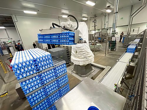 MIKE DEAL / FREE PRESS
A large robotic arm lifts huge pallets of eggs in the processing plant.
Agriculture Minister Ron Kostyshyn announces during a press conference at the Burnbrae Farms processing plant (500 Pandora Ave. W), that the governments of Canada and Manitoba are investing in several major capital infrastructure and investment projects under the Sustainable Canadian Agriculture Partnership (Sustainable CAP) that will increase food processing capacity in Manitoba, allowing producers to sell more of their product locally and create more agricultural jobs.
Reporter: Martin Cash
241128 - Thursday, November 28, 2024.
