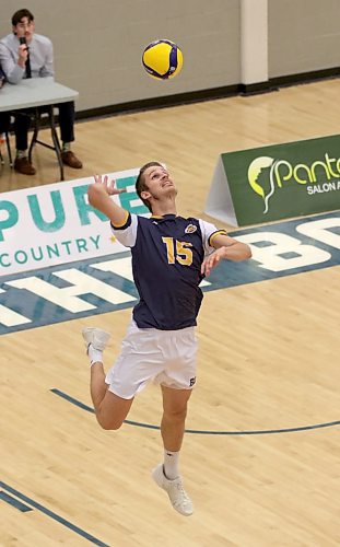 Brandon University Bobcats Philipp Lauter serves against the Alberta Golden Bears during their Canada West men's volleyball match at the Healthy Living Centre on Friday evening. (Thomas Friesen/The Brandon Sun)