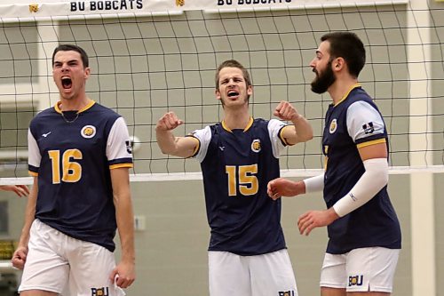 The Brandon University Bobcats celebrate their four-set win over the No. 1-ranked Alberta Golden Bears in Canada West men's volleyball action at the Healthy Living Centre on Friday. (Thomas Friesen/The Brandon Sun)