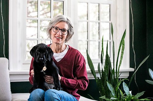 MIKAELA MACKENZIE / FREE PRESS
	
Lorraine Rempel, who volunteers her time raising puppies that will go on to become CNIB guide dogs, with Ollie on Friday, Nov. 29, 2024. 

For Aaron Epp story.
Winnipeg Free Press 2024