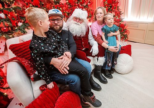 JOHN WOODS / FREE PRESS
Santa entertains Derrick and Katie Kerkowick and their children Mack, 6, and Evie, 3, during a photo session at The Dream Factory&#x2019;s Santa Suite at the Fairmont Hotel   Sunday, December 1, 2024. The Dream Factory event runs each weekend until December 22.

Reporter: standup