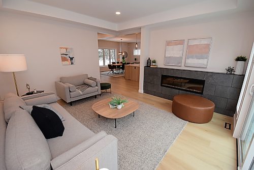 Todd Lewys / Free Press
Well-defined yet still connected to the kitchen/dining area, the great room is a cosy space that comes with a linear electric fireplace set in a grey, low-profile feature wall.