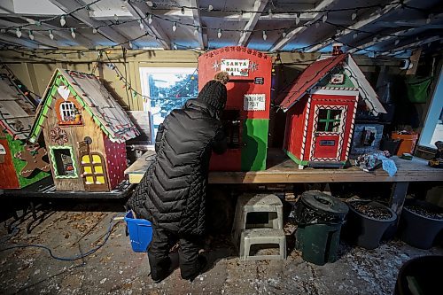 JOHN WOODS / FREE PRESS
Jen de Delley and her husband Victor Diduch set up their Christmas Village at their house in River Heights Sunday, December 1, 2024. They have building and adding to it for the past 18 years.

Reporter: av