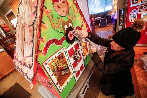 JOHN WOODS / FREE PRESS
Jen de Delley and her husband Victor Diduch set up their Christmas Village at their house in River Heights Sunday, December 1, 2024. They have building and adding to it for the past 18 years.

Reporter: av