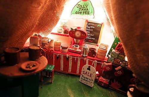 JOHN WOODS / FREE PRESS
Jen de Delley and her husband Victor Diduch set up their Christmas Village at their house in River Heights Sunday, December 1, 2024. They have building and adding to it for the past 18 years.

Reporter: av