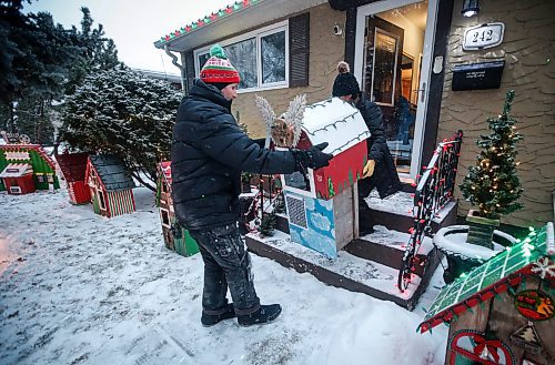 JOHN WOODS / FREE PRESS
Jen de Delley and her husband Victor Diduch set up their Christmas Village at their house in River Heights Sunday, December 1, 2024. They have building and adding to it for the past 18 years.

Reporter: av