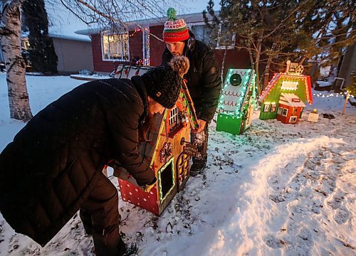 JOHN WOODS / FREE PRESS
Jen de Delley and her husband Victor Diduch set up their Christmas Village at their house in River Heights Sunday, December 1, 2024. They have building and adding to it for the past 18 years.

Reporter: av