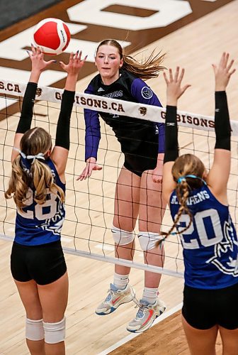 JOHN WOODS / WINNIPEG FREE PRESS
Vincent Massey Vikings&#x2019; Zoe Price (4) wins the point against Jeanne-Sauve Olympiens&#x2019; Lily Market (28) and Madison Steingart (20) in the Manitoba High School 2022 AAAA Varsity Volleyball Provincial Championship at the University of Manitoba Monday, December 2, 2024.