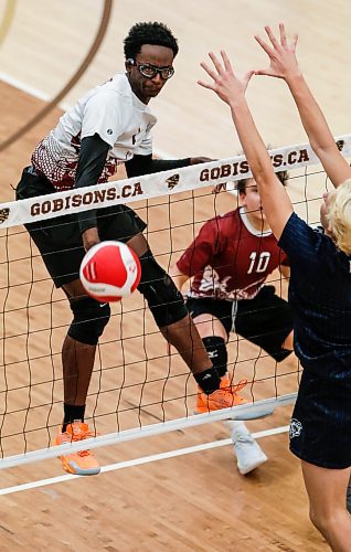 JOHN WOODS / WINNIPEG FREE PRESS
St Paul&#x2019;s Crusaders&#x2019; Funmi Sofoluwe (1) scores against River East Kodiaks in the Manitoba High School 2022 AAAA Varsity Volleyball Provincial Championship at the University of Manitoba Monday, December 2, 2024.