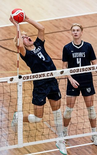 JOHN WOODS / WINNIPEG FREE PRESS
River East Kodiaks&#x2019; Eli Ulrich (9) returns the ball to St Paul&#x2019;s Crusaders in the Manitoba High School 2022 AAAA Varsity Volleyball Provincial Championship at the University of Manitoba Monday, December 2, 2024.