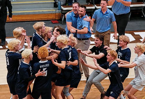 JOHN WOODS / WINNIPEG FREE PRESS
River East Kodiaks celebrate a win over the St Paul&#x2019;s Crusaders in the Manitoba High School 2022 AAAA Varsity Volleyball Provincial Championship at the University of Manitoba Monday, December 2, 2024.