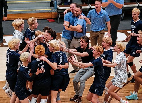 JOHN WOODS / WINNIPEG FREE PRESS
River East Kodiaks celebrate a win over the St Paul&#x2019;s Crusaders in the Manitoba High School 2022 AAAA Varsity Volleyball Provincial Championship at the University of Manitoba Monday, December 2, 2024.