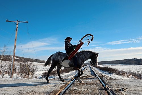 03122024
The Sioux Valley Dakota Nation Unity Riders lead the way to escort 11 bison (often referred to as buffalo in Dakota culture) through Birdtail Sioux First Nation to their new home in an enclosure in Birdtail&#x2019;s valley on Tuesday. The bison, including one white bison, were a gift to Birdtail from Sioux Valley. 
(Tim Smith/The Brandon Sun)