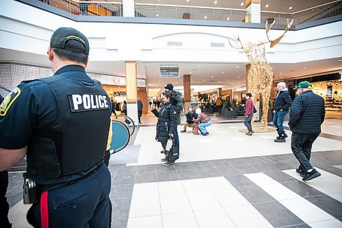 MIKAELA MACKENZIE / FREE PRESS
	
Community relations officers attend a press conference announcing increased police presence in shopping malls during the holiday shopping season at Polo Park mall on Wednesday, Dec. 4, 2024. 

For Eric story.
Winnipeg Free Press 2024