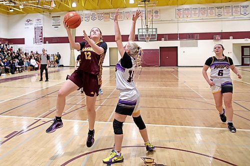 Madysyn Taillefer of Crocus Plains shoots as Virden's Maddie Potter-Lukye defends. The Plainsmen won 74-17. (Tim Smith/The Brandon Sun)
