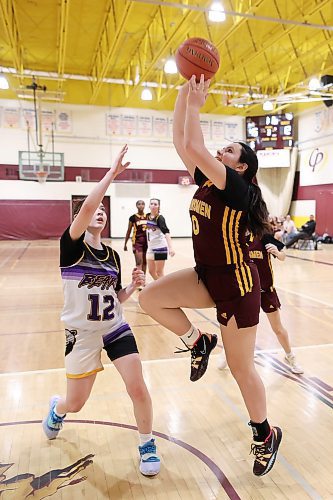 06122024
Brooklyn Catagas #0 of the Crocus Plainsmen leaps to take a shot on the net during the Plainsmen’s opening match against the Virden Bears in the Crocus Plains Early Bird Varsity Girls Basketball Tournament at CPRSS on Friday morning. 
(Tim Smith/The Brandon Sun)
