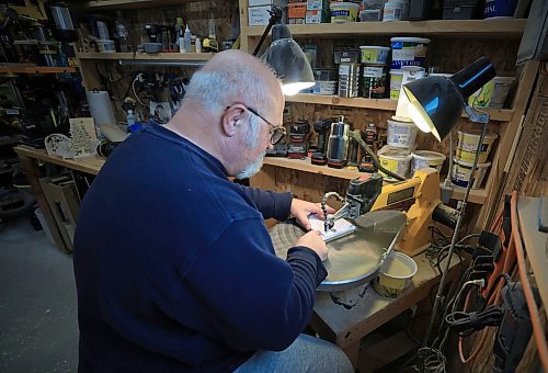 RUTH BONNEVILLE / FREE PRESS

Local Miracle on Mountain

Ken Lowe (also known as big Geppetto), holds some of his wooden Christmas ornaments in his wood working shop that he designs and makes for the Christmas Cheer Board.  

See Rollason story

Dec 5th, 2024