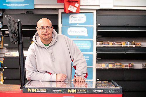 MIKAELA MACKENZIE / FREE PRESS
Ramsey Zeid, Food Fare manager, with the cigarette display at the Maryland store on Friday, Dec. 6, 2024. Food Fare has seen a drastic decrease in cigarette sales over the last few years, and part of the reason could be illegal cigarette sales, Ramsey said.
For Gabby story.
Winnipeg Free Press 2024