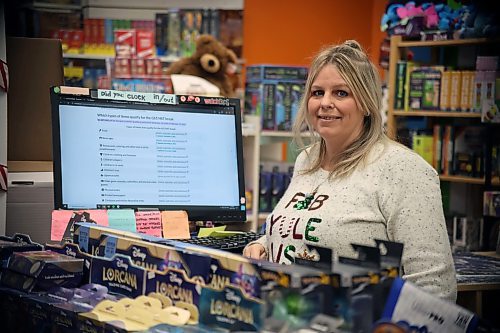 Amber Hagans is preparing to manually adjust all GST sales on her toy store inventory next week. It will bring her in compliance with the federal government's promised GST/HST holiday, which was announced less than three weeks ago. She is a co-owner at Toymasters in Brandon on 18th Street. (Connor McDowell/Brandon Sun)