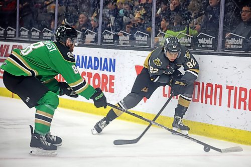 07122024
Dominik Petr #82 of the Brandon Wheat Kings and Vojtech Vochvest #8 of the Prince Albert Raiders battle for the puck during WHL action at Westoba Place on Saturday evening. 
(Tim Smith/The Brandon Sun)