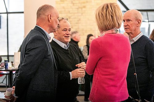 MIKAELA MACKENZIE / FREE PRESS
	
Editor Paul Samyn and CEO Mike Power mingle with subscribers at the Winnipeg Free Press sip and shop event at The Forks on Monday, Dec. 2, 2024. 

Standup.
Winnipeg Free Press 2024