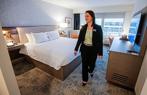 JOHN WOODS / FREE PRESS
The new Hampton Inn Winnipeg Downtown general manager Amanda Janz walks through newly renovated hotel bedroom which opened Tuesday, December 9, 2024.
Reporter: aaron