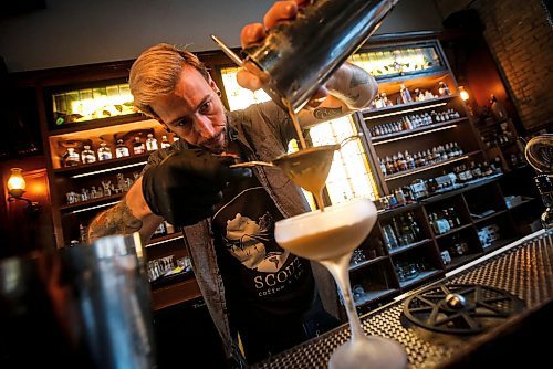 JOHN WOODS / FREE PRESS
Patent 5 bar manager Phil Tessier created two  Christmas drinks, an alcoholic drink called J&#xe4;g N&#xf6;g and a non-alcoholic drink called Working Late Nogtini.  Working Late Nogtini is photographed Tuesday, December 3, 2024. 

Reporter: av