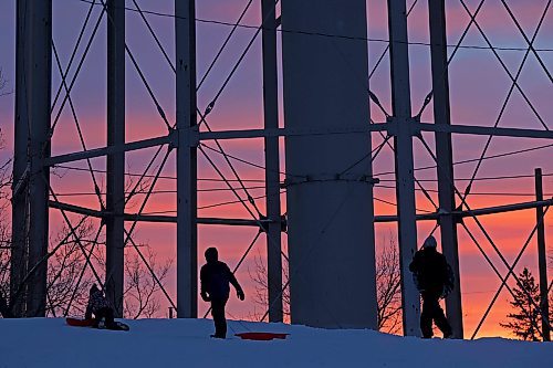 Kids sled at Rideau Park as the sun sets on Tuesday. According to Environment Canada, temperatures will be much colder today and tomorrow, before warming back up to minus single digits again for the weekend. 
(Tim Smith/The Brandon Sun)