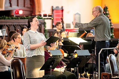 MIKAELA MACKENZIE / FREE PRESS
	
Soprano McKenzie Warriner sings with the Winnipeg Symphony Orchestra during a rehearsal for Handel's Messiah at Knox United Church on Tuesday, Dec. 10, 2024.


Winnipeg Free Press 2024