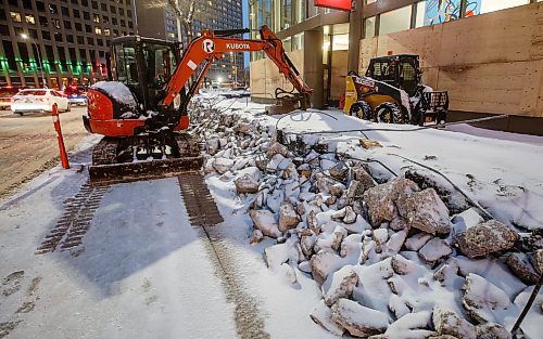 JOHN WOODS / FREE PRESS
Portage and Main barricades are being demolished Tuesday, December 10, 2024. 

Reporter: ?