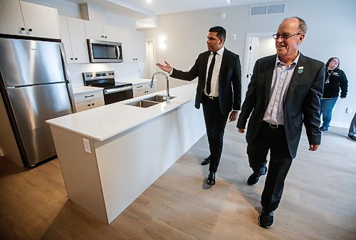 JOHN WOODS / FREE PRESS
Nigel Furgus, president and CEO of Paragon Living, left, shows city councillor Shawn Dobson around a suite at The Parkbridge, their new residential building at 2140 Portage Ave, Tuesday, December 10, 2024. 

Reporter: aaron