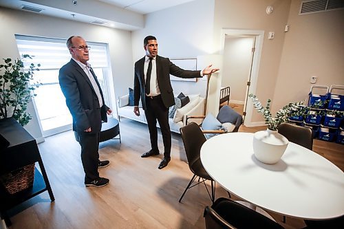 JOHN WOODS / FREE PRESS
Nigel Furgus, president and CEO of Paragon Living, right, shows city councillor Shawn Dobson around a suite at The Parkbridge, their new residential building at 2140 Portage Ave, Tuesday, December 10, 2024. 

Reporter: aaron