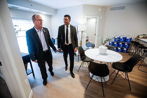 JOHN WOODS / FREE PRESS
Nigel Furgus, president and CEO of Paragon Living, right, shows city councillor Shawn Dobson around a suite at The Parkbridge, their new residential building at 2140 Portage Ave, Tuesday, December 10, 2024. 

Reporter: aaron