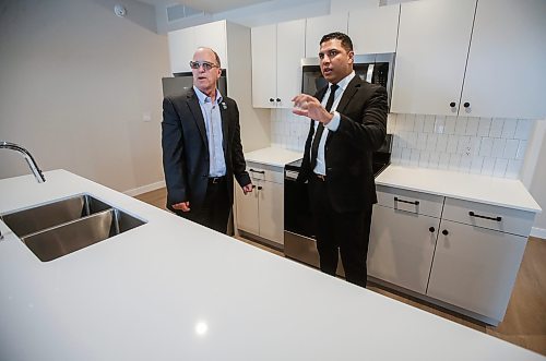 JOHN WOODS / FREE PRESS
Nigel Furgus, president and CEO of Paragon Living, right, shows city councillor Shawn Dobson around a suite at The Parkbridge, their new residential building at 2140 Portage Ave, Tuesday, December 10, 2024. 

Reporter: aaron